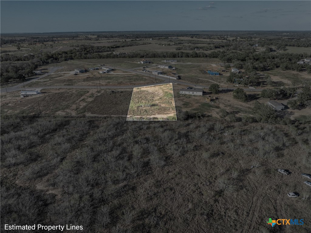 105 Sly St Dale Dale, TX 78616 - Photo 8 of 16 a view of a dry yard