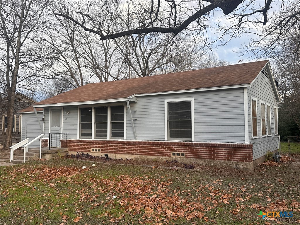505 Center Street Belton, TX 76513 - Photo 10 of 11 a front view of a house with garden