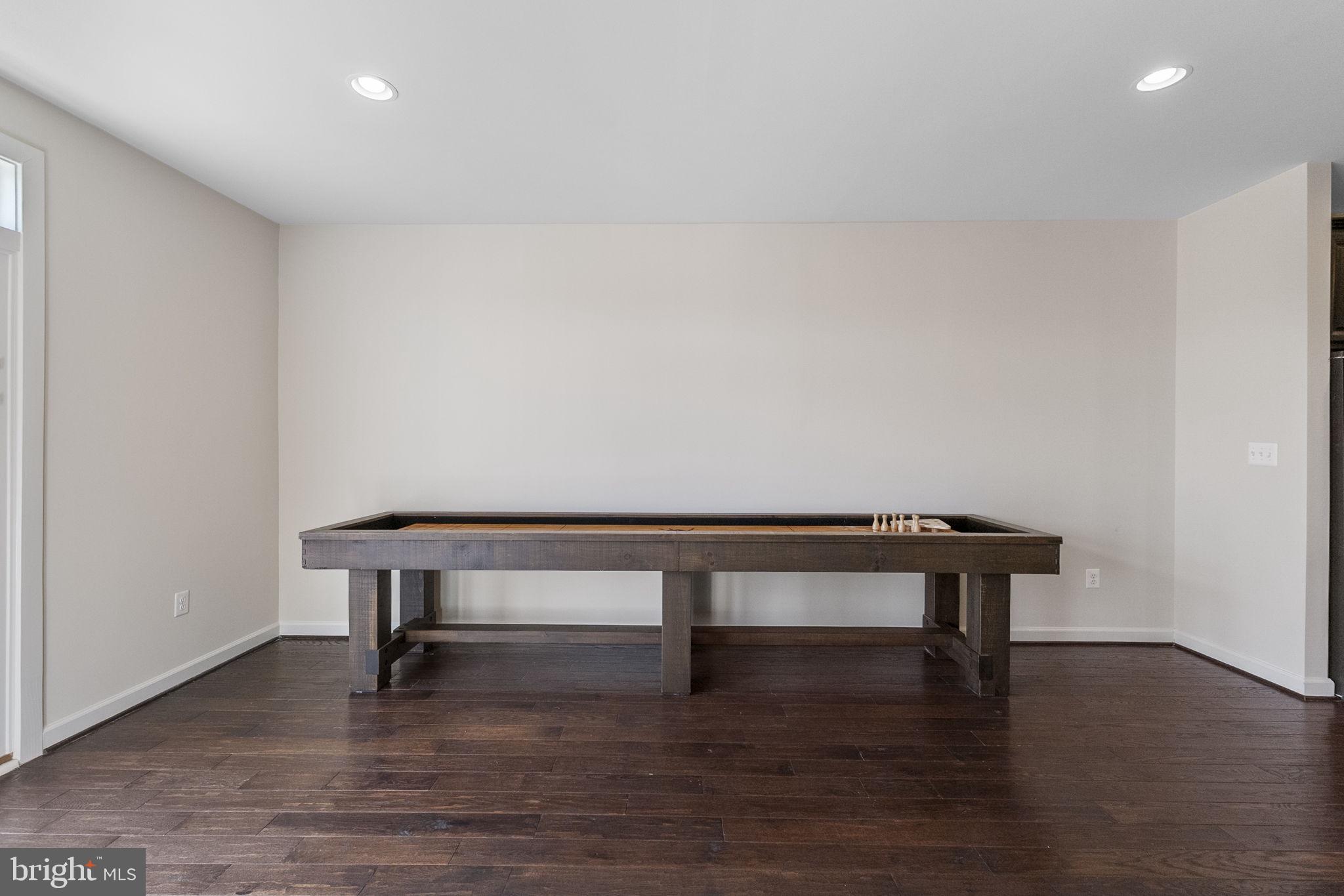 5313 Stream Bank Lane Greenbelt, MD 20770 - Photo 17 of 46 a view of workspace with wooden floor