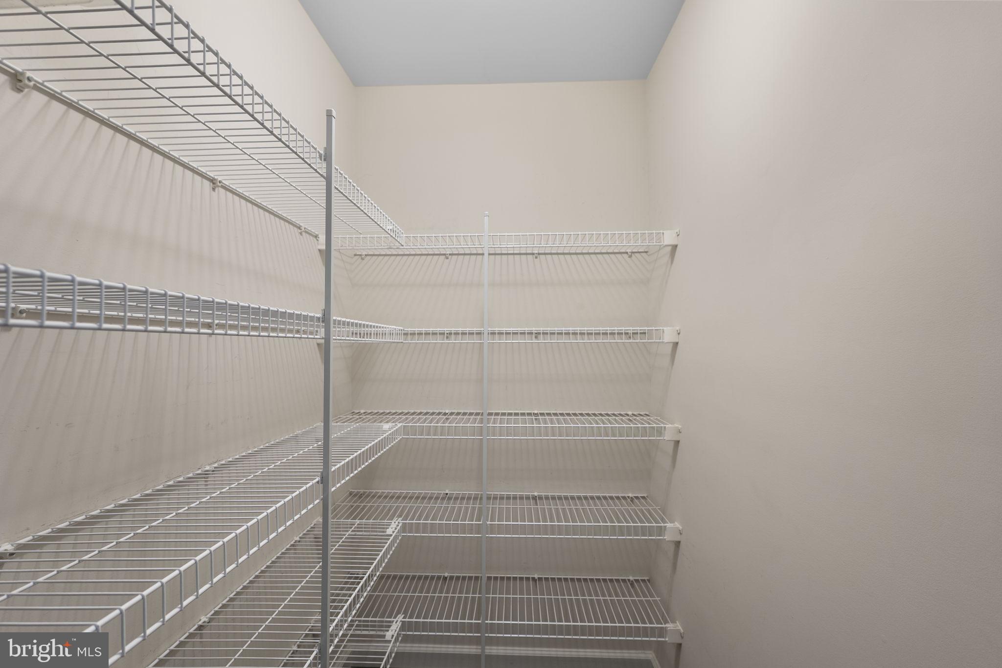 5313 Stream Bank Lane Greenbelt, MD 20770 - Photo 40 of 46 a view of a room with racks on the wall