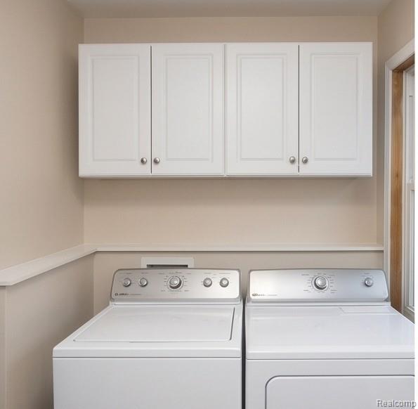 8922 Stone Road Algonac, MI 48001 - Photo 15 of 15 White shaker-style cabinetry with silver-tone hardware
