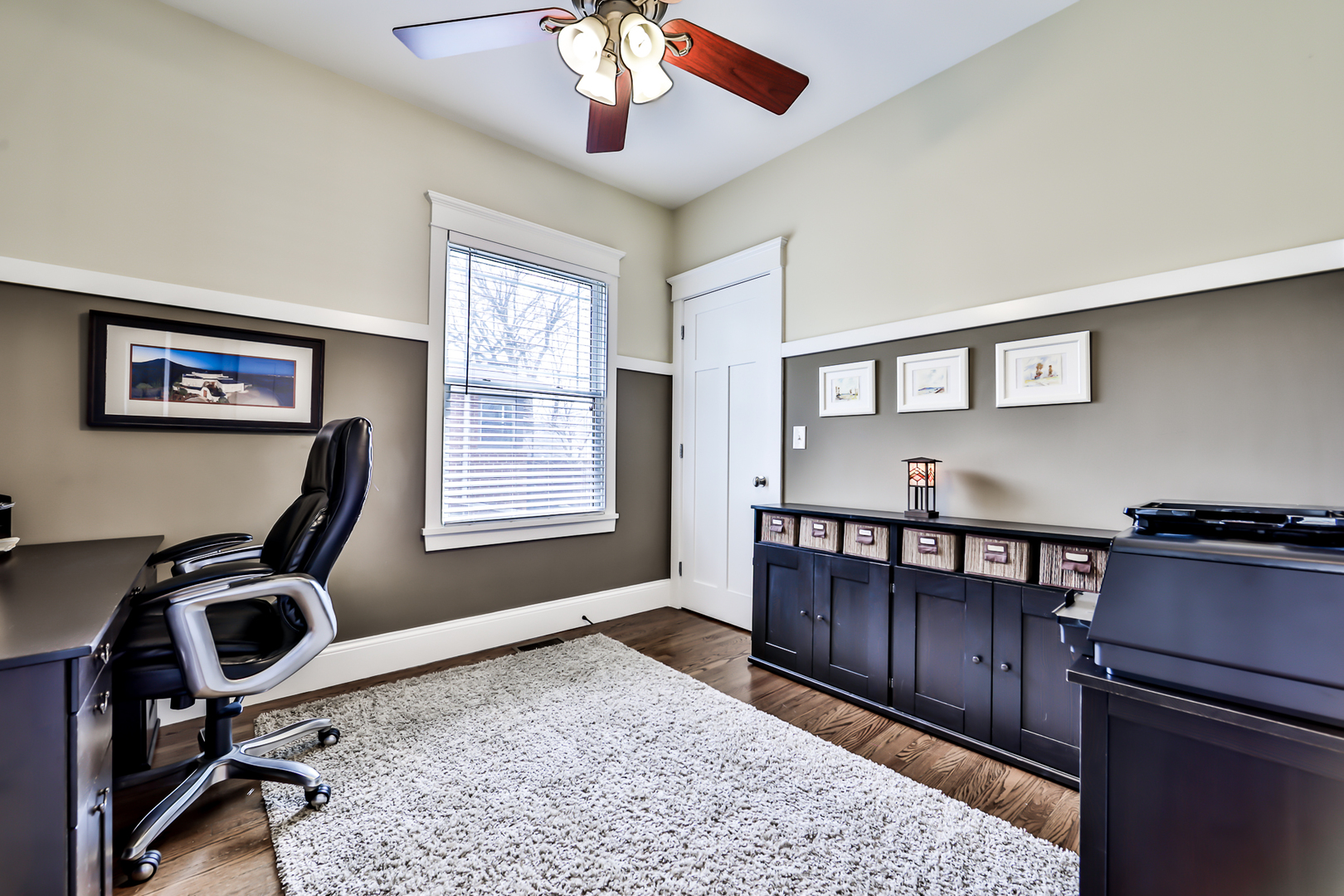65 East Quincy Street Riverside, IL 60546 - Photo 19 of 49 a view of a workspace with furniture and a window