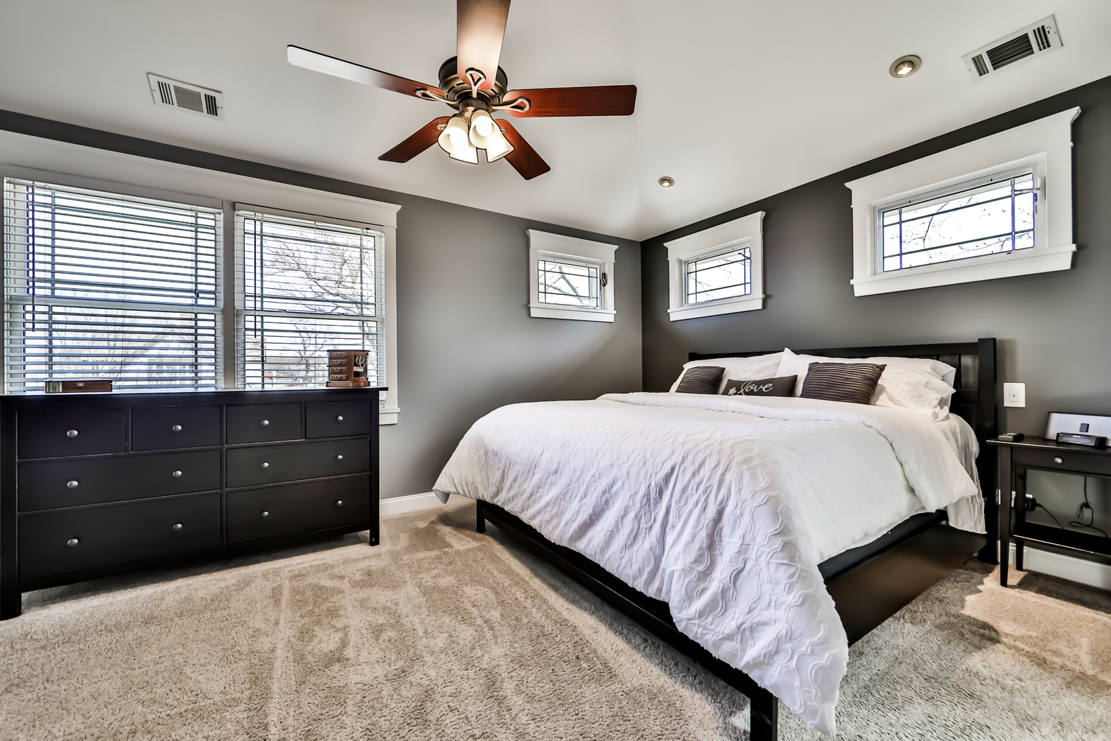 65 East Quincy Street Riverside, IL 60546 - Photo 20 of 49 a bedroom with a large bed and a window