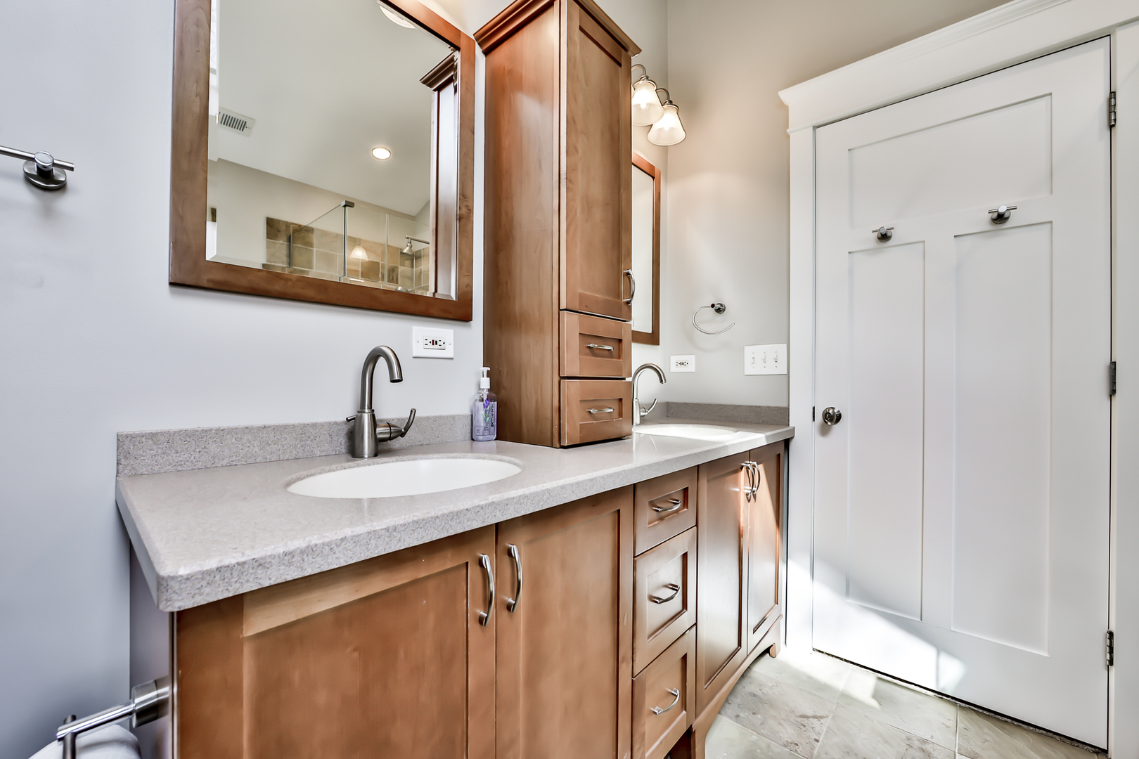 65 East Quincy Street Riverside, IL 60546 - Photo 25 of 49 a bathroom with a sink and a mirror