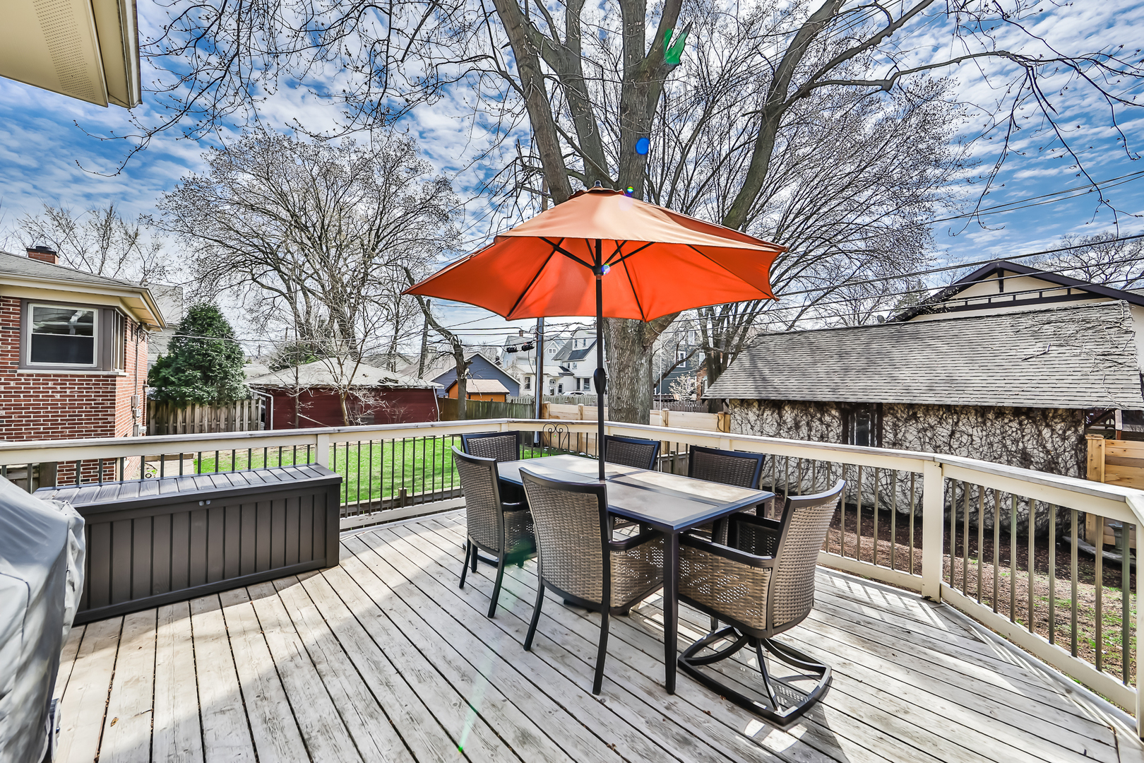65 East Quincy Street Riverside, IL 60546 - Photo 38 of 49 a view of a roof deck with table and chairs