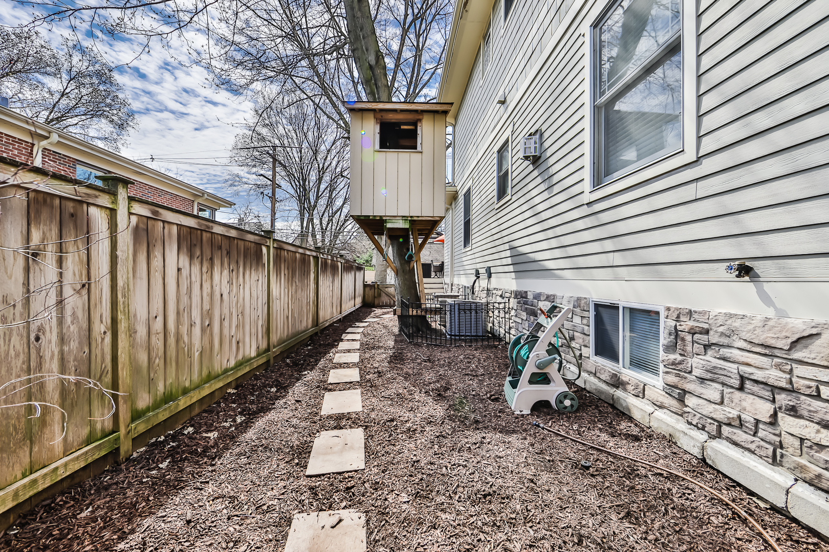 65 East Quincy Street Riverside, IL 60546 - Photo 41 of 49 a view of a house with backyard and sitting area