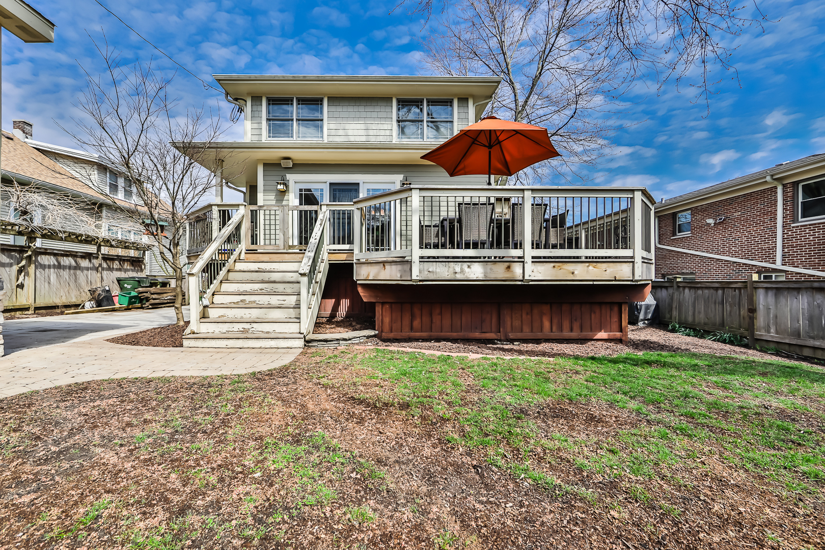 65 East Quincy Street Riverside, IL 60546 - Photo 44 of 49 a front view of a house with a yard