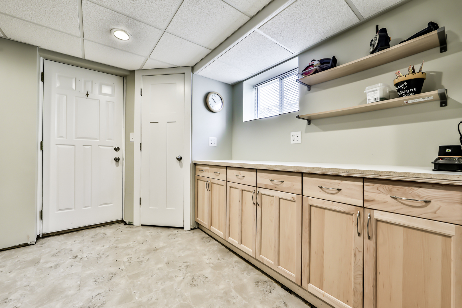 65 East Quincy Street Riverside, IL 60546 - Photo 46 of 49 a view of a closet with white cabinets