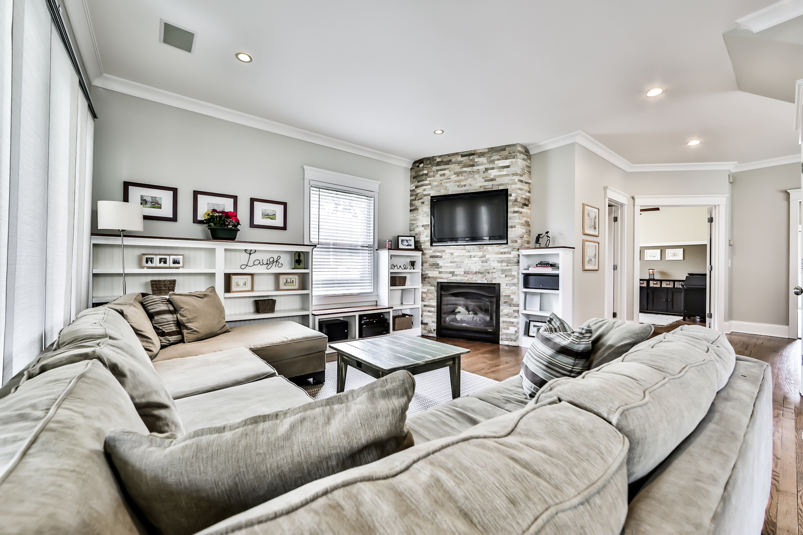 65 East Quincy Street Riverside, IL 60546 - Photo 8 of 49 a living room with furniture fireplace and a television