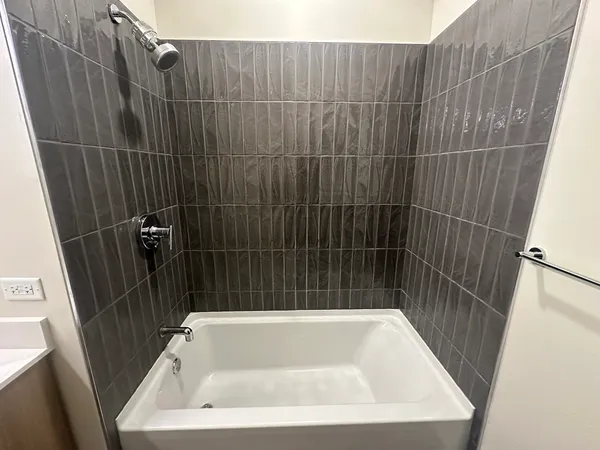 a bathroom with a bathtub