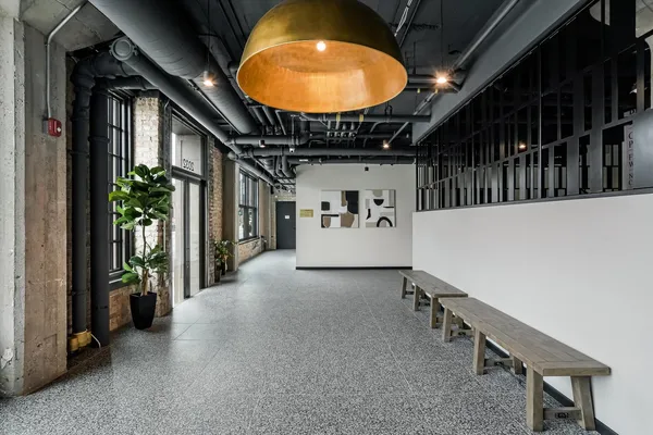 a view of an entryway with a hallway