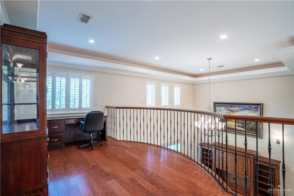 2013 Sabinal Street Mission, TX 78572 - Photo 20 of 33 a view of a workspace with furniture and a window