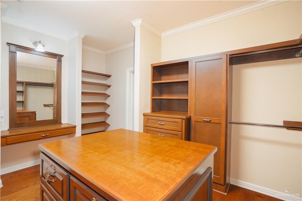 2013 Sabinal Street Mission, TX 78572 - Photo 26 of 33 a room with closet and wooden floor