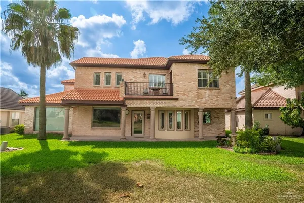 a view of a kitchen with a sink and cabinets