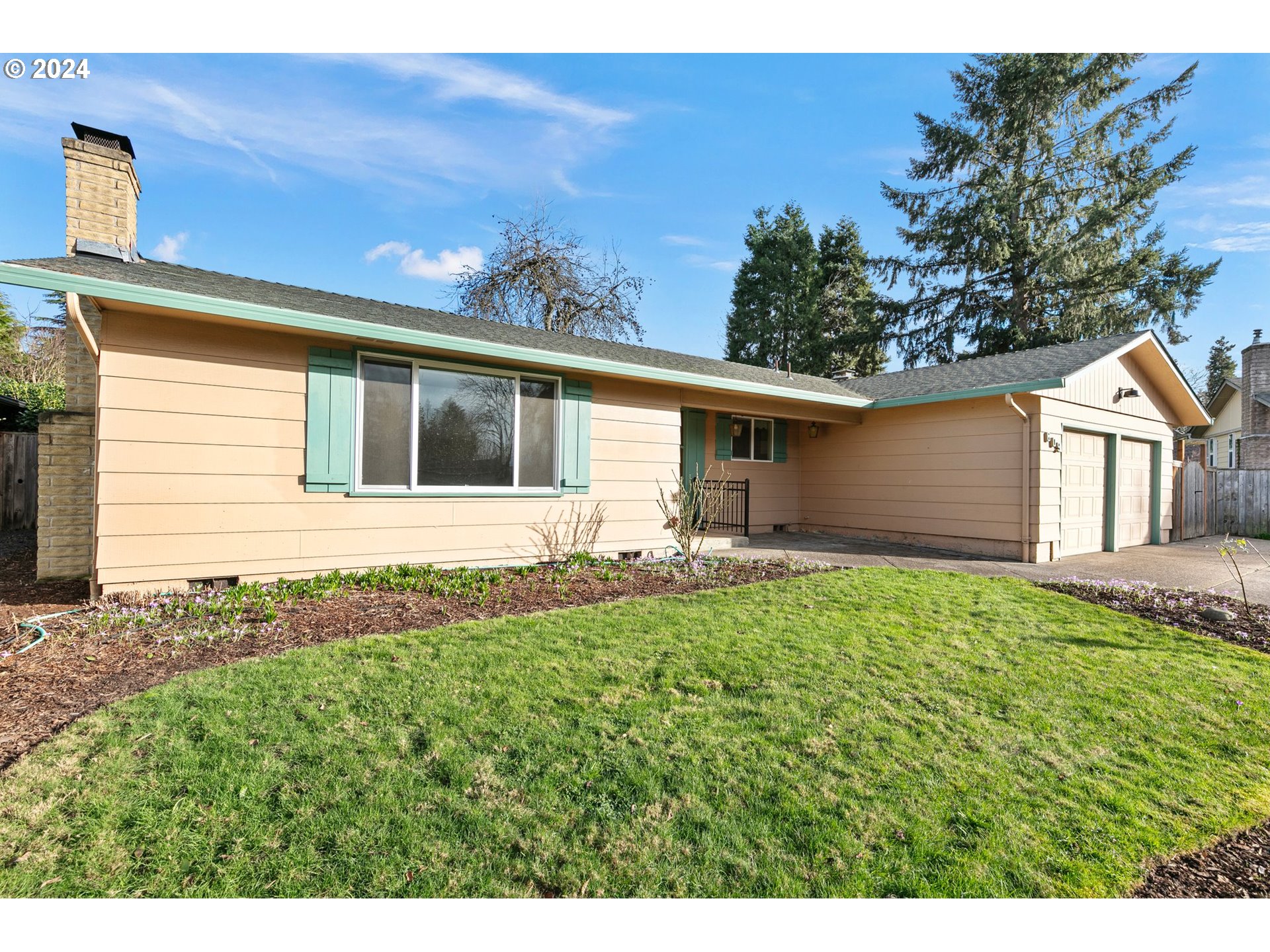 609 Rowan Avenue Springfield, OR 97477 - Photo 2 of 32 a house view with a backyard space
