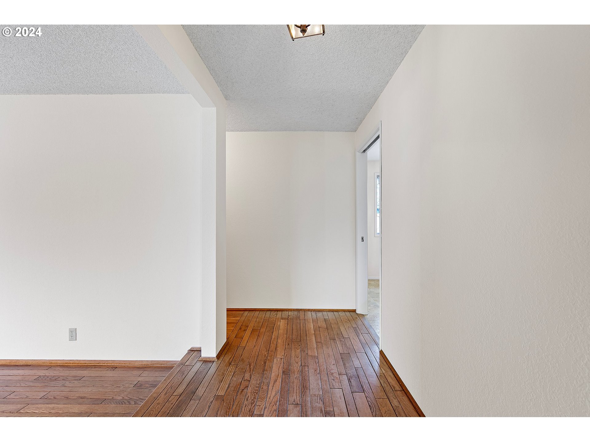 609 Rowan Avenue Springfield, OR 97477 - Photo 3 of 32 a view of an empty room