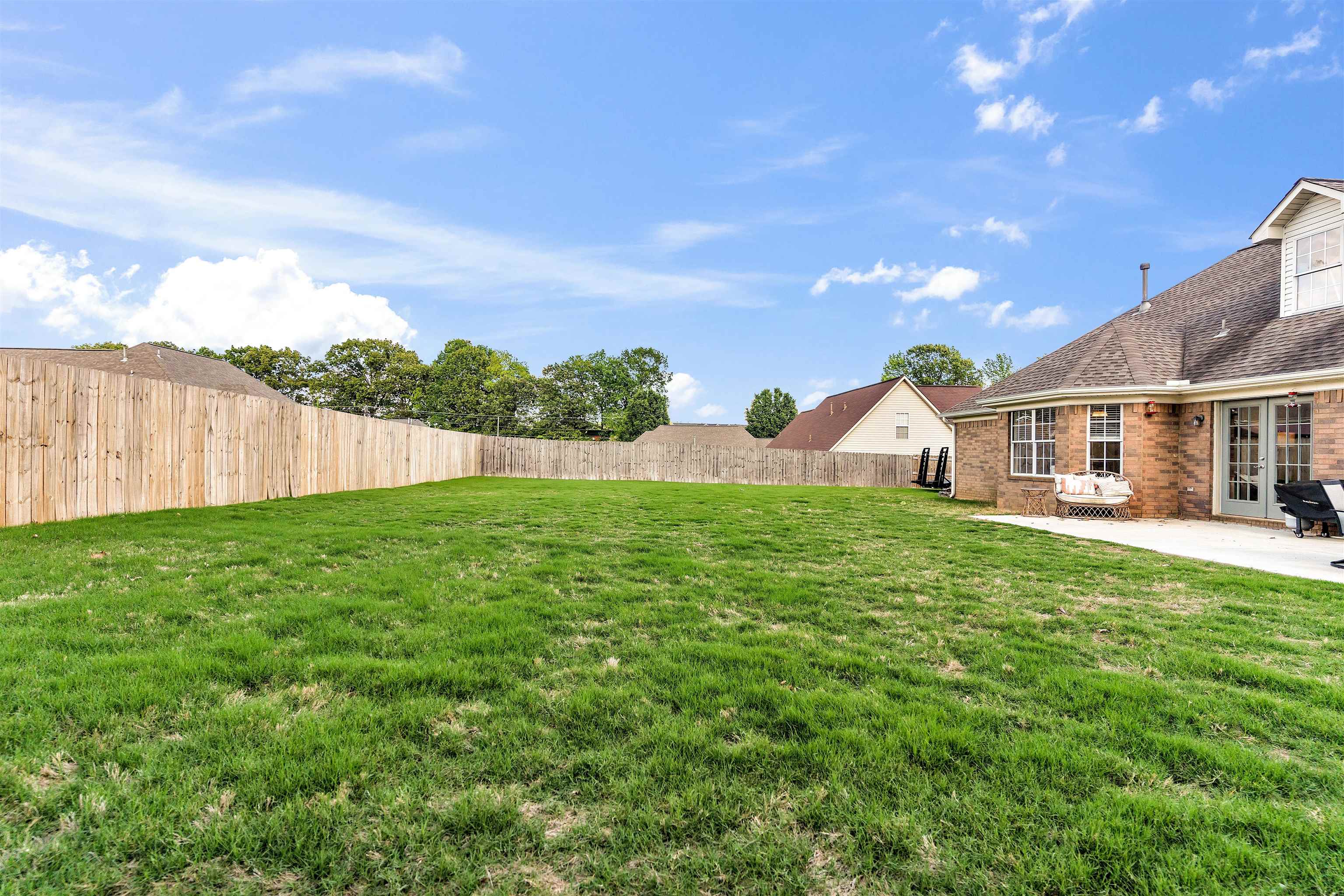 126 Buck Stand Road Atoka, TN 38004 - Photo 20 of 21 View of yard with a patio and french doors