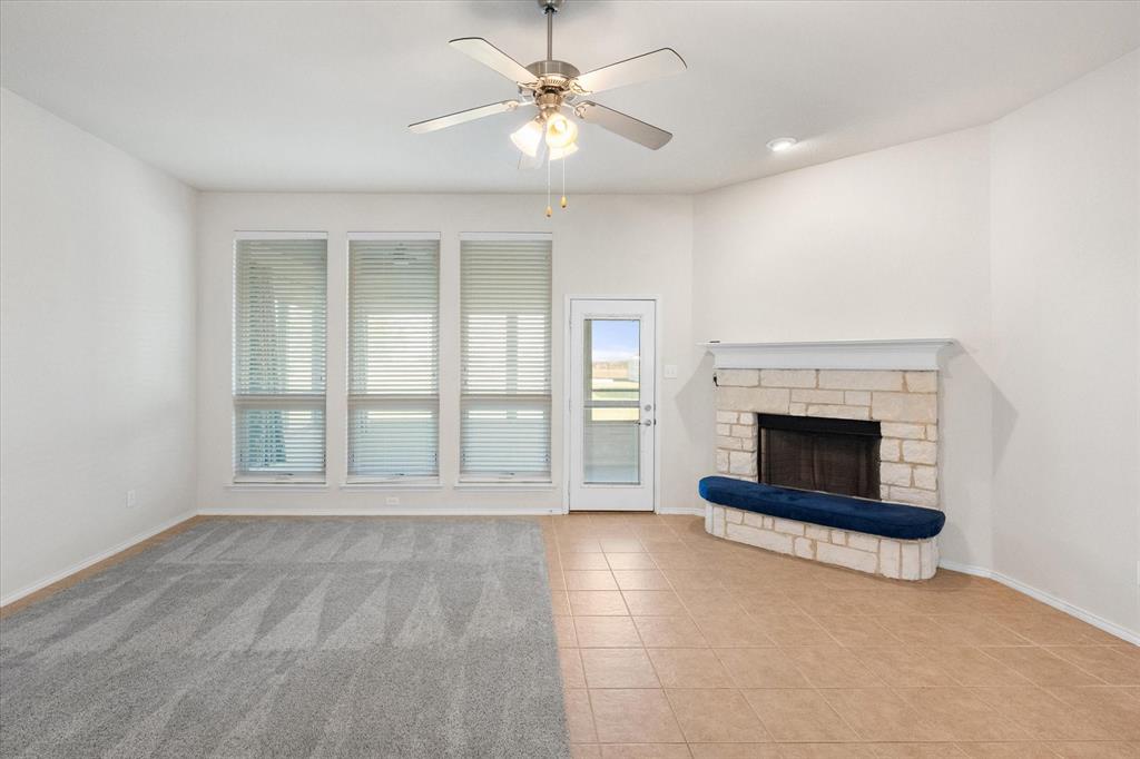 10929 Soft Shell Drive Venus, TX 76084 - Photo 18 of 39 a view of an empty room with a fireplace