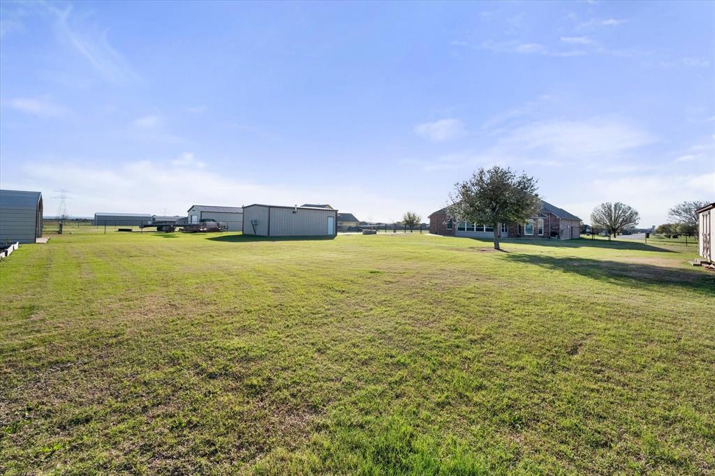 10929 Soft Shell Drive Venus, TX 76084 - Photo 37 of 39 a view of an ocean and beach