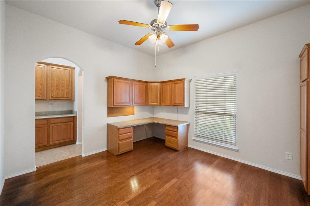 10929 Soft Shell Drive Venus, TX 76084 - Photo 7 of 39 a view of room with workspace and windows