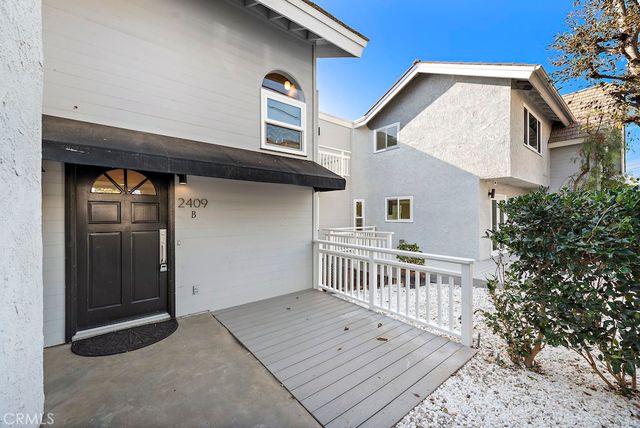 a view of a house with wooden floor