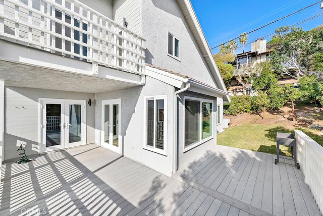 a view of a house with roof deck