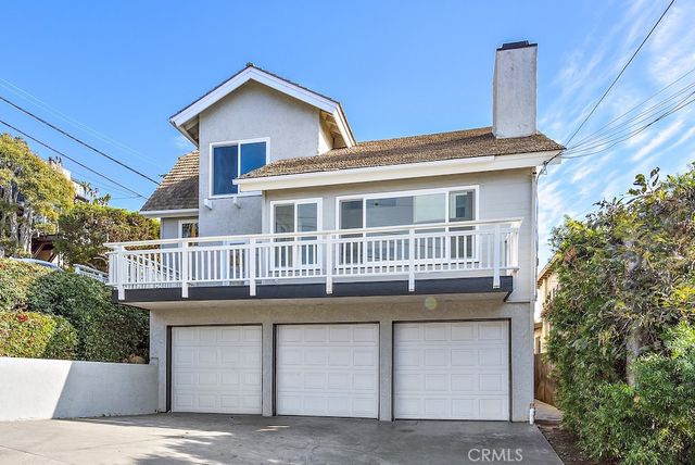 a view of a house with a roof deck