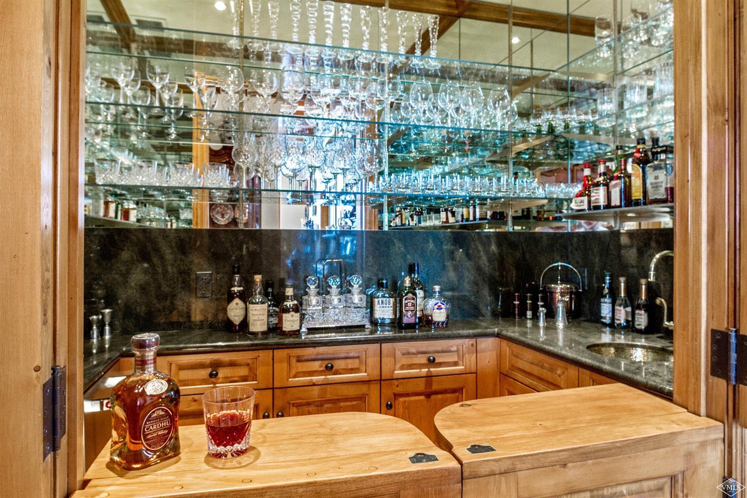 157 Pilgrim Drive Edwards, CO 81632 - Photo 17 of 29 a room with lots of bottles of alcohol