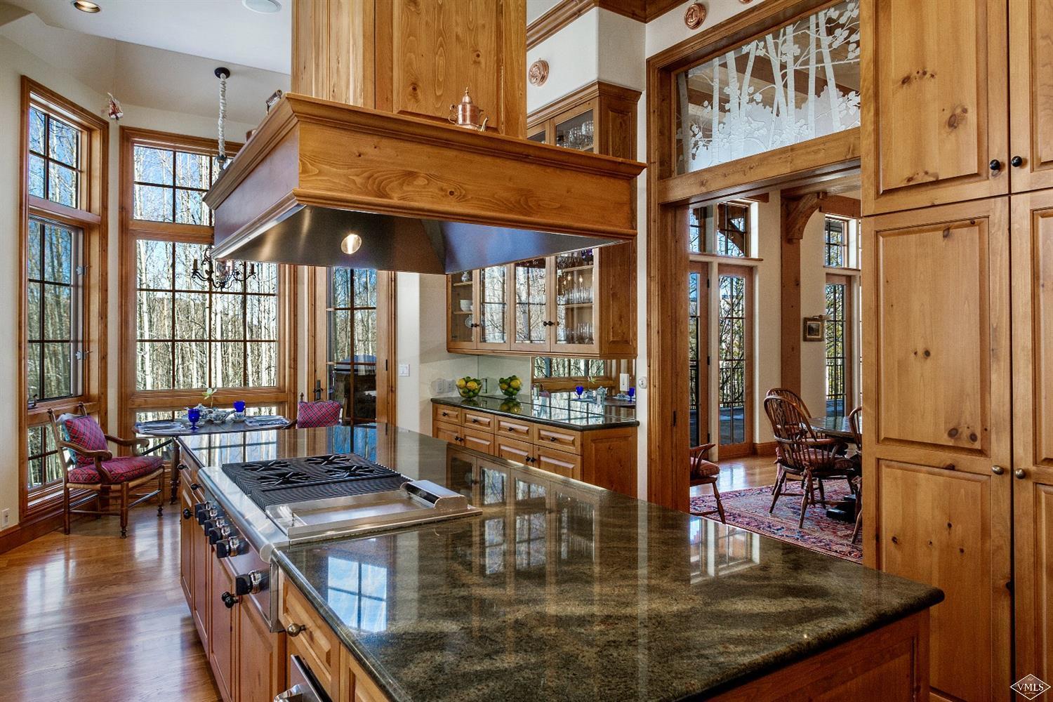 157 Pilgrim Drive Edwards, CO 81632 - Photo 19 of 29 a kitchen with stainless steel appliances granite countertop a stove and cabinets
