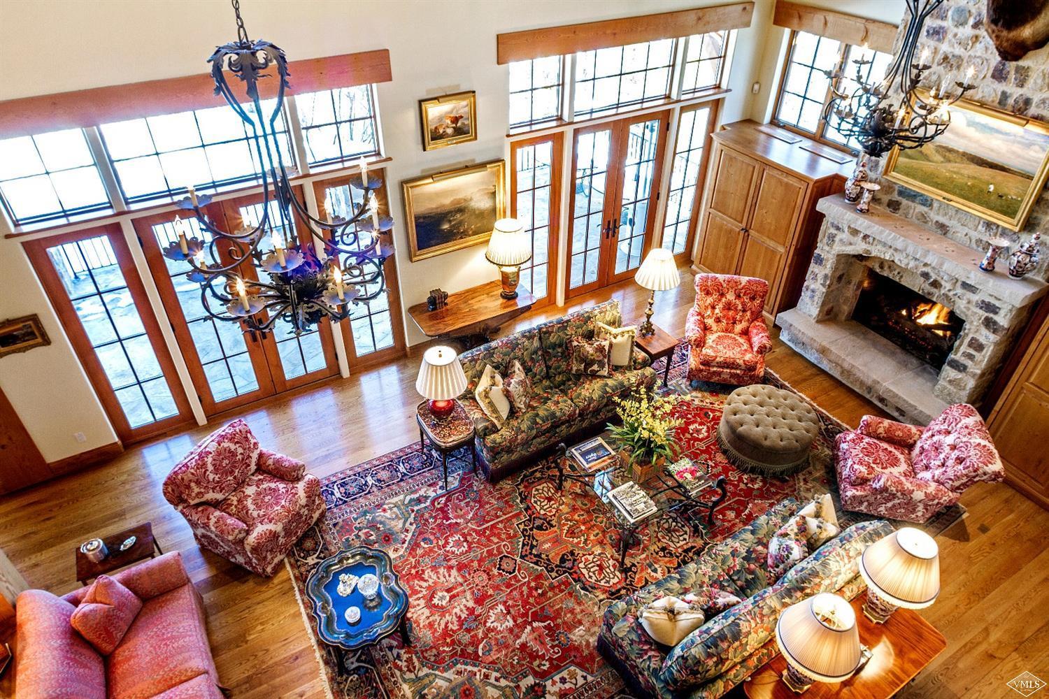 157 Pilgrim Drive Edwards, CO 81632 - Photo 20 of 29 a living room with furniture and a floor to ceiling window