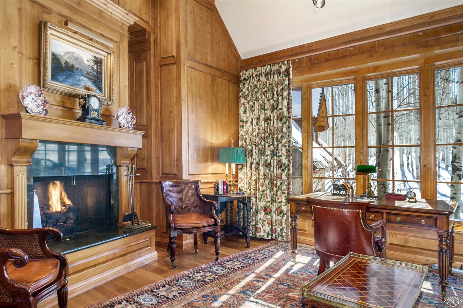 157 Pilgrim Drive Edwards, CO 81632 - Photo 23 of 29 a living room with furniture and a fireplace