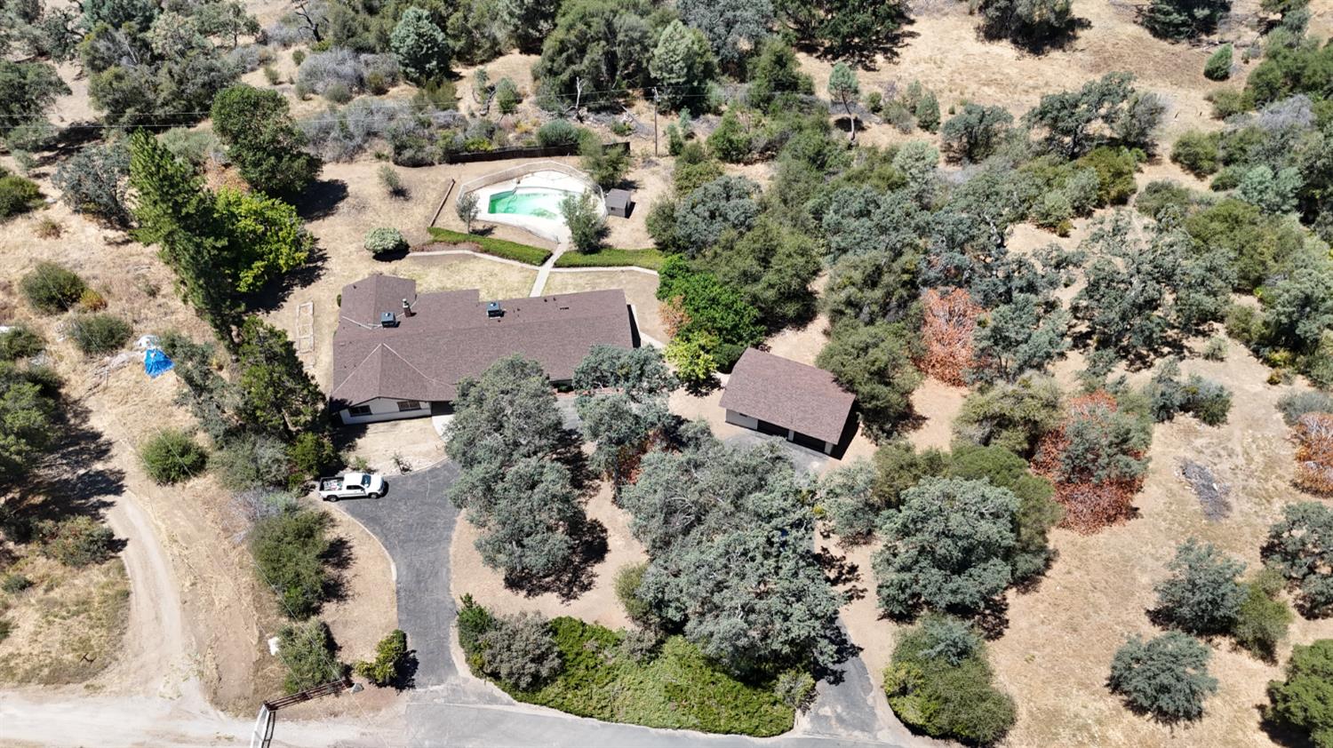 31612 Duke Road North Fork, CA 93643 - Photo 44 of 44 an aerial view of a house with a yard