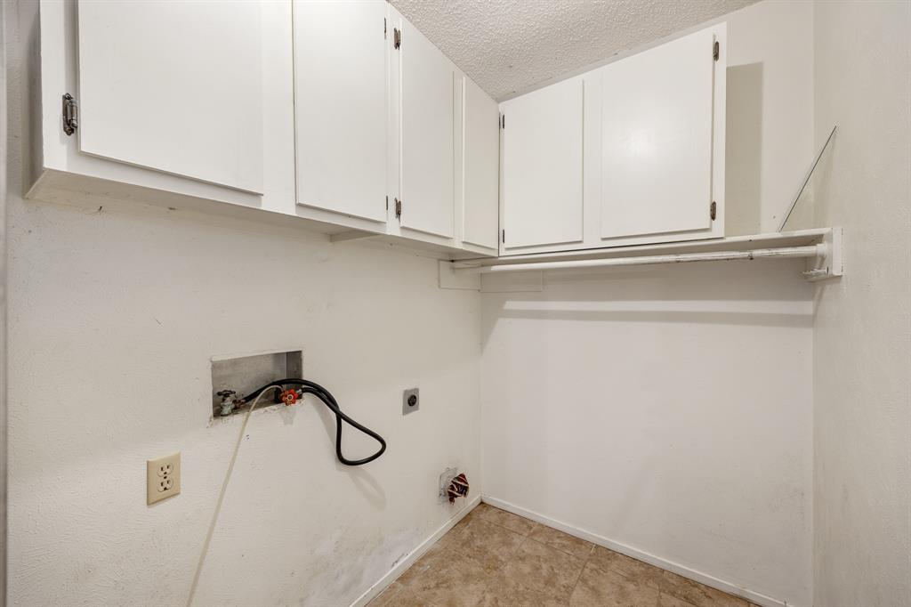 24264 State Highway Canton, TX 75103 - Photo 13 of 38 a view of a room with rack on the wall