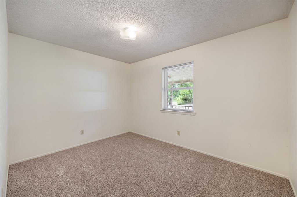 24264 State Highway Canton, TX 75103 - Photo 16 of 38 an empty room with a window