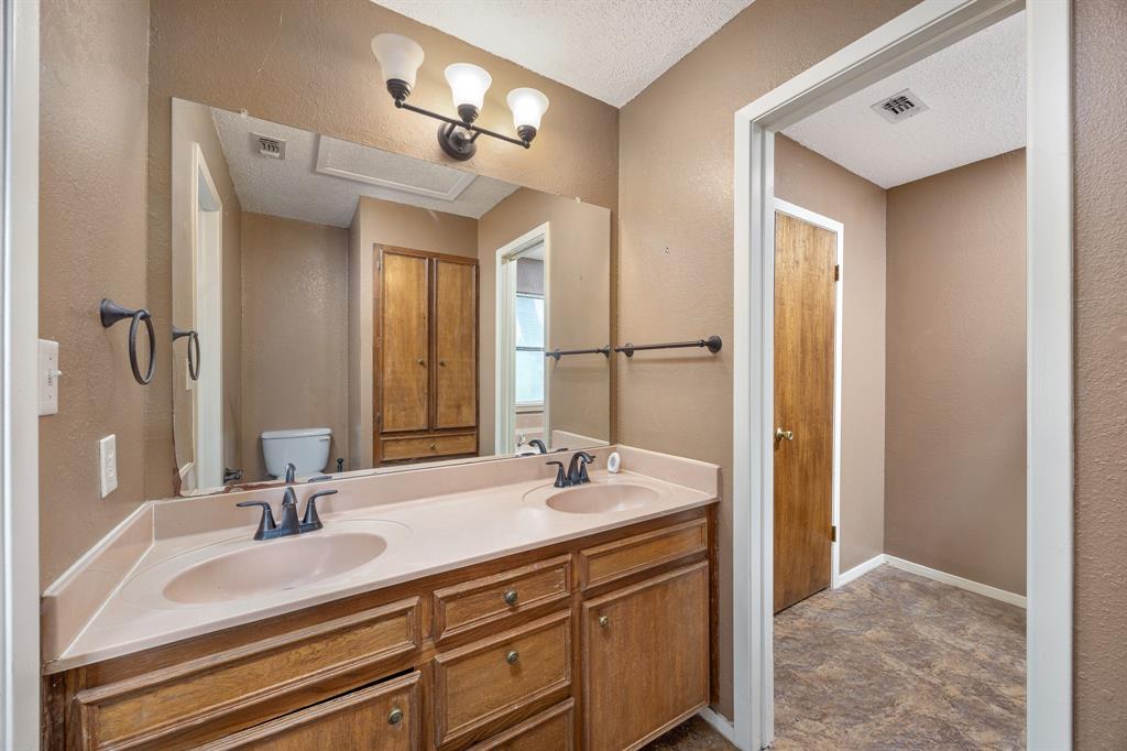 24264 State Highway Canton, TX 75103 - Photo 23 of 38 a bathroom with a sink and a mirror