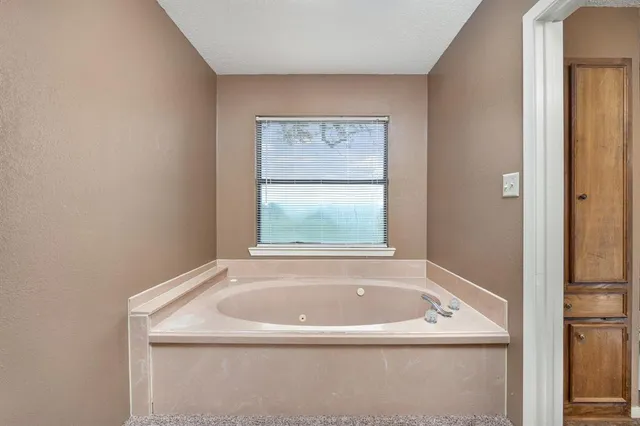 a bathroom with a bathtub