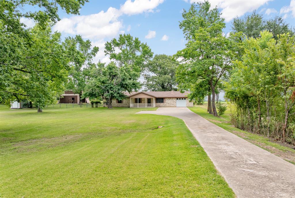 24264 State Highway Canton, TX 75103 - Photo 37 of 38 a view of a swimming pool with a garden