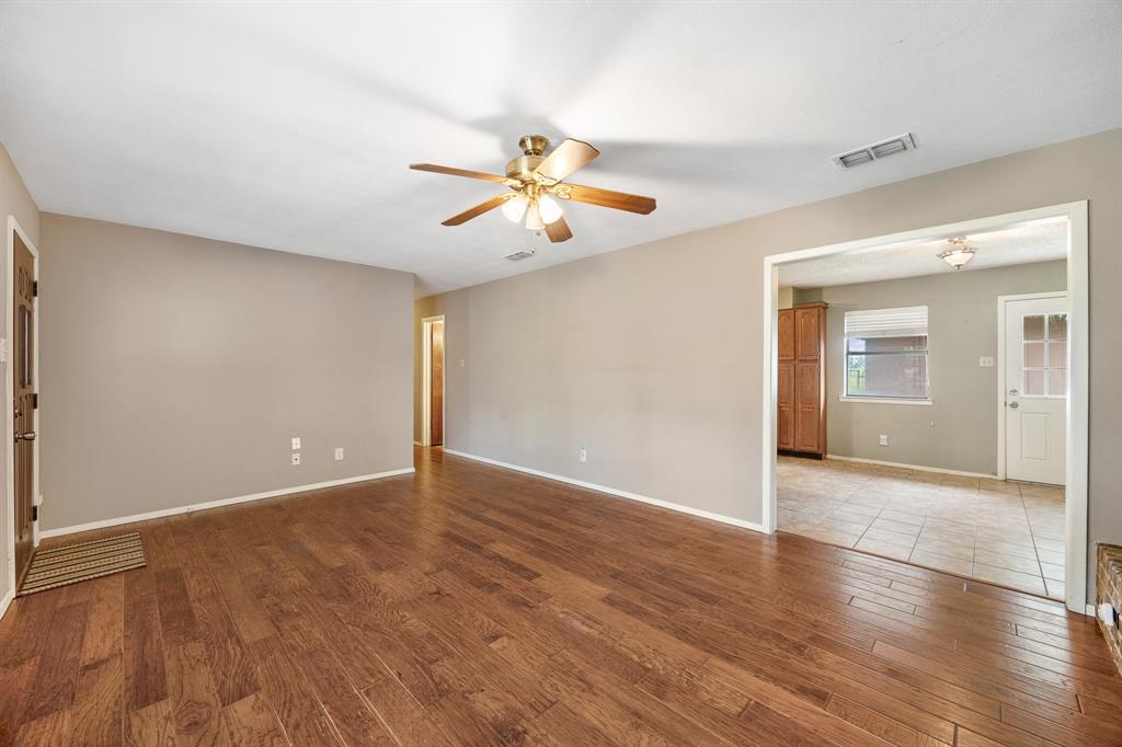24264 State Highway Canton, TX 75103 - Photo 5 of 38 a view of an empty room with window and wooden floor