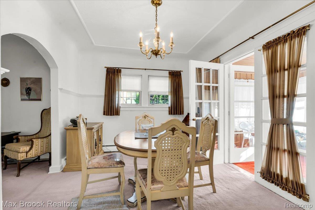 224 Cherokee Road Pontiac, MI 48341 - Photo 8 of 27 Formal Dining Room leading to enclosed porch