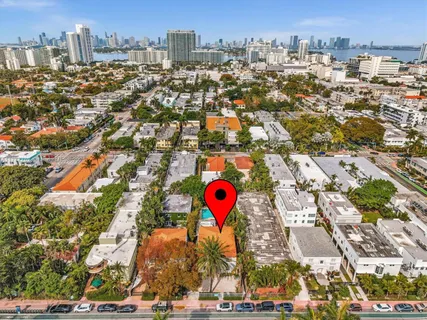 an aerial view of residential building and parking space