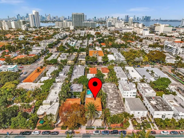 an aerial view of residential building and parking space