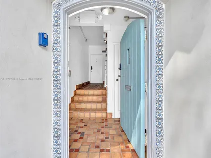 a view of a bathroom from a hallway