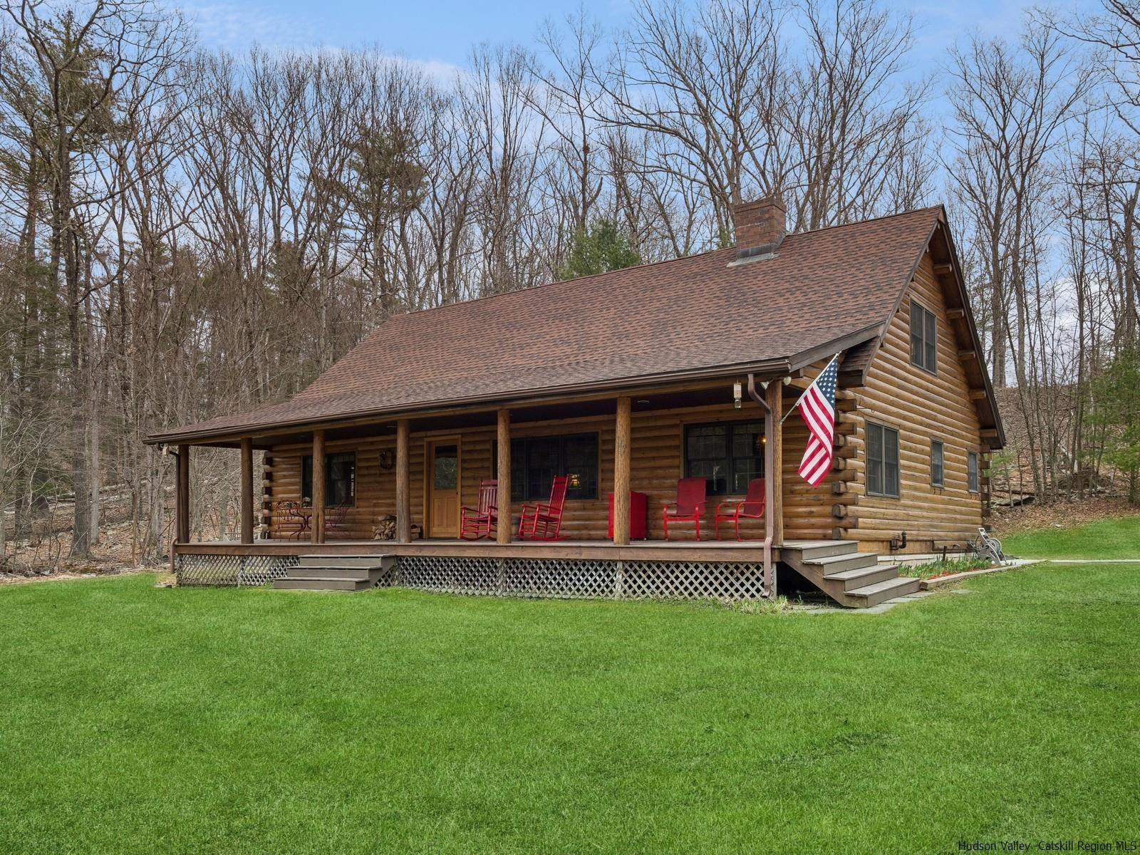 815 Peak Road Stone Ridge, NY 12484 - Photo 1 of 35 a view of a house with a yard and sitting area