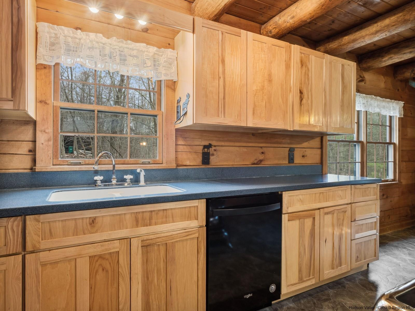 815 Peak Road Stone Ridge, NY 12484 - Photo 12 of 35 a kitchen with a sink and a window