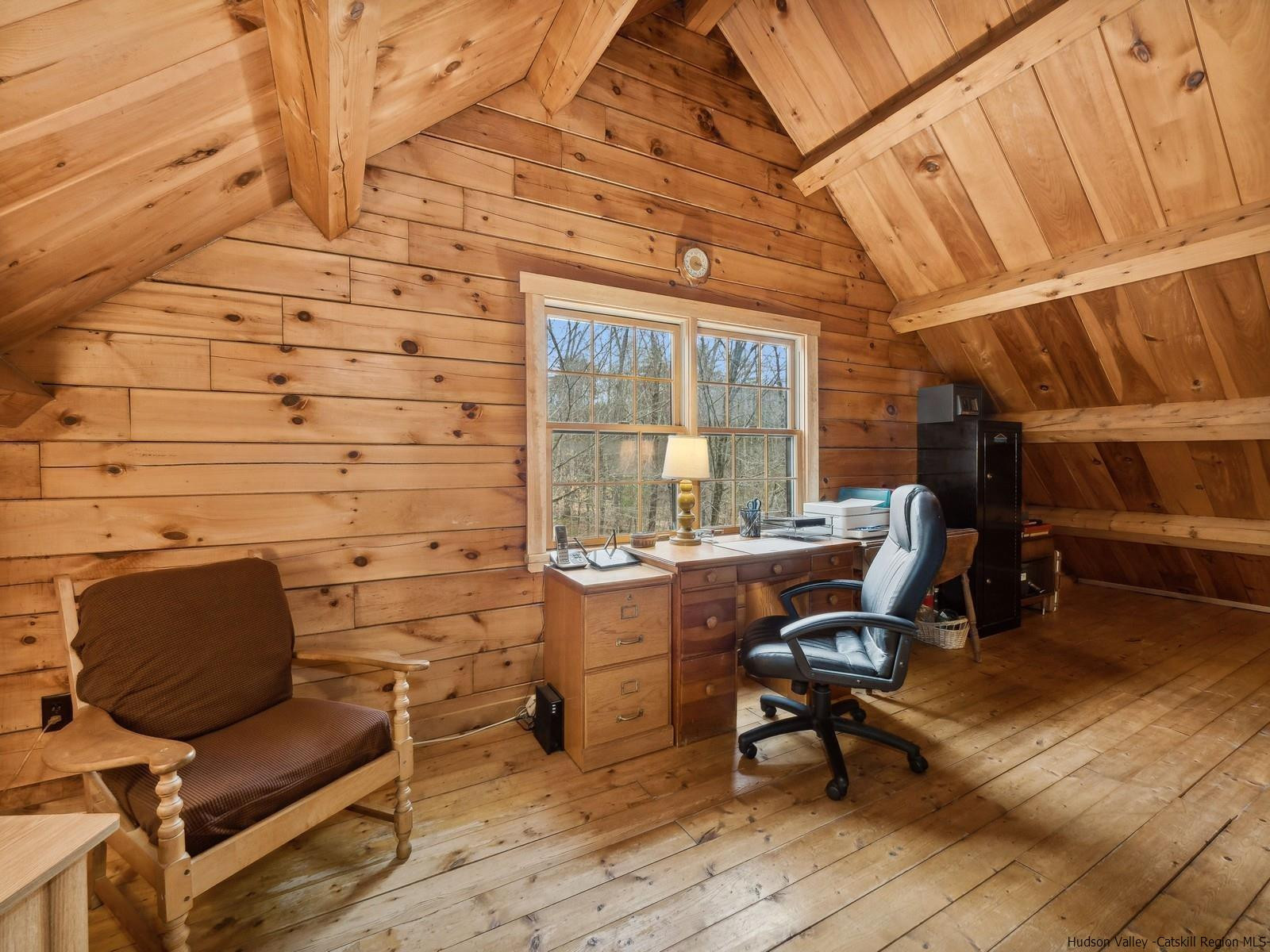 815 Peak Road Stone Ridge, NY 12484 - Photo 29 of 35 a view of workspace with wooden floor and windows
