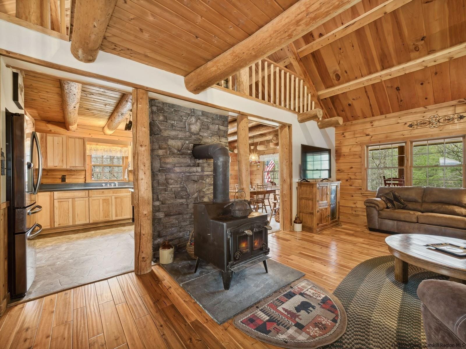 815 Peak Road Stone Ridge, NY 12484 - Photo 10 of 35 a living room with furniture and wooden floor