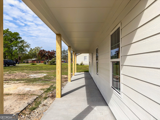 352 College Street Southwest Pelham, GA 31779 - Photo 5 of 9 a view of a porch