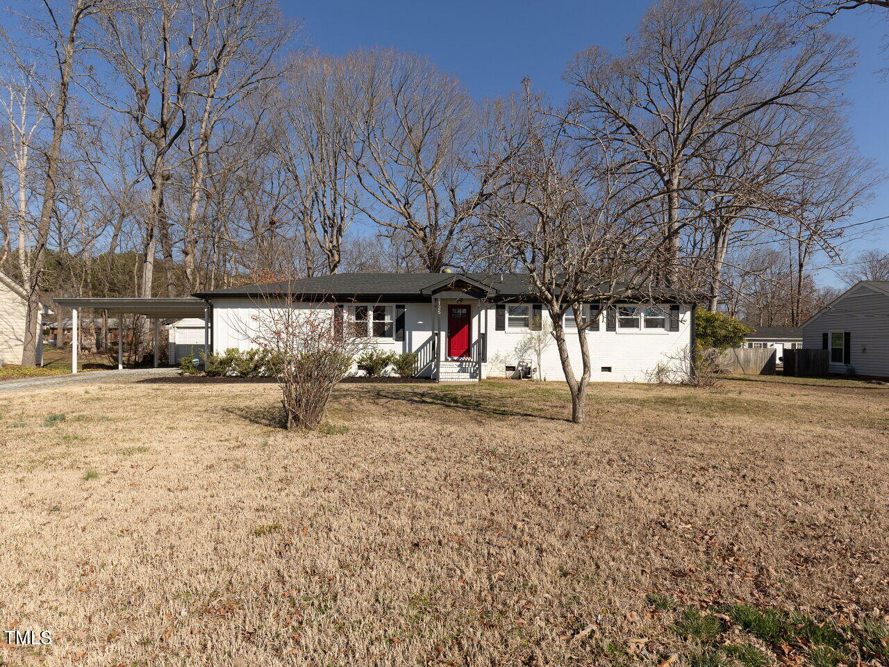a view of street with large trees