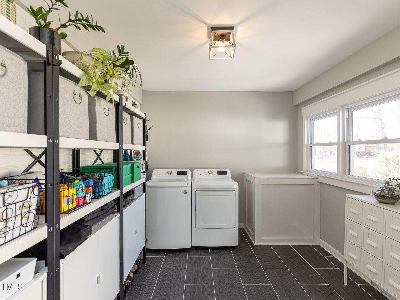 125 Crestview Drive Durham, NC 27712 - Photo 13 of 30 a room with storage and utility