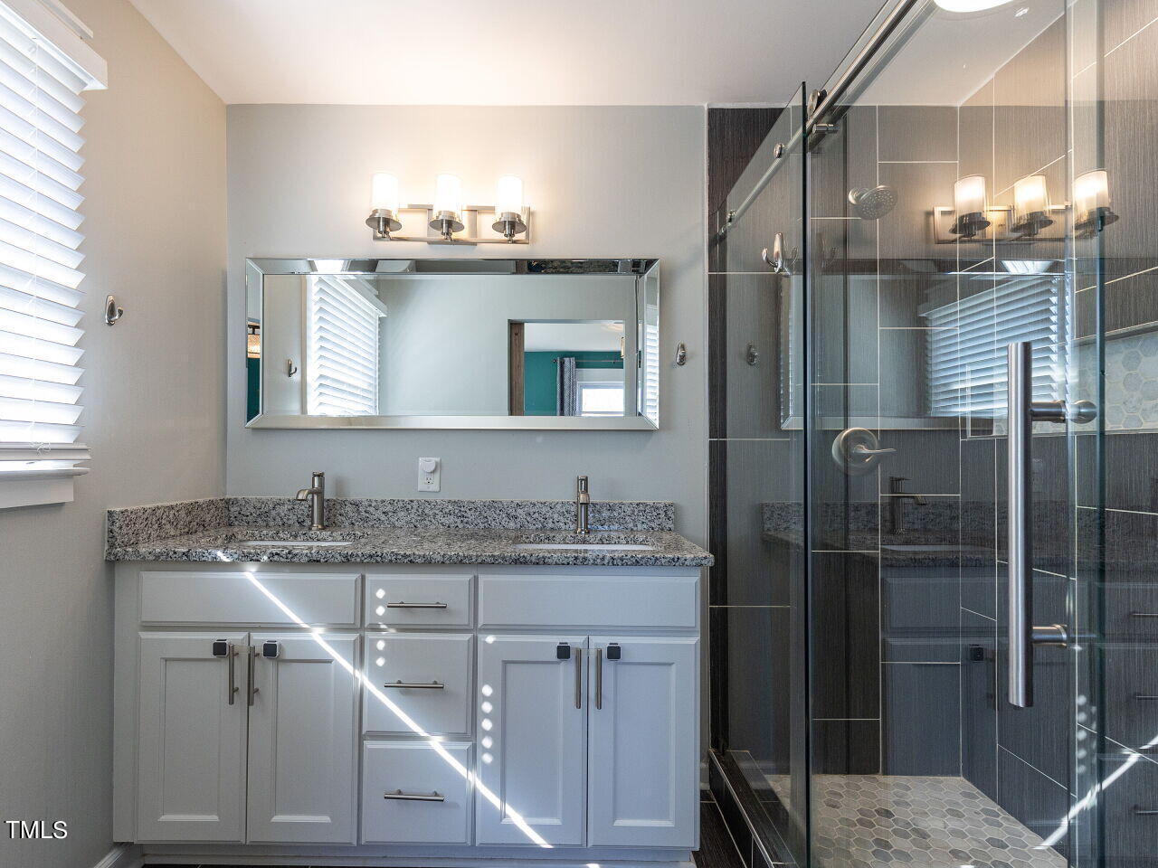 125 Crestview Drive Durham, NC 27712 - Photo 20 of 30 a bathroom with a sink and a mirror